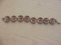 Pop Out Penny 8 Coin Bracelet