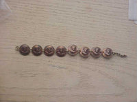 Pop Out Penny 8 Coin Bracelet