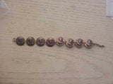 Pop Out Penny 8 Coin Bracelet